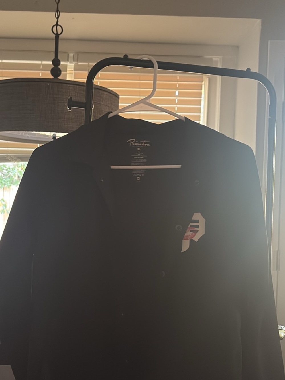 Primitive Black Coach Jacket with Chest Graphic